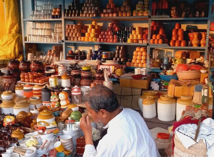 Travelers exploring the historic ghats of Varanasi along the Ganges during a three-day Varanasi itinerary