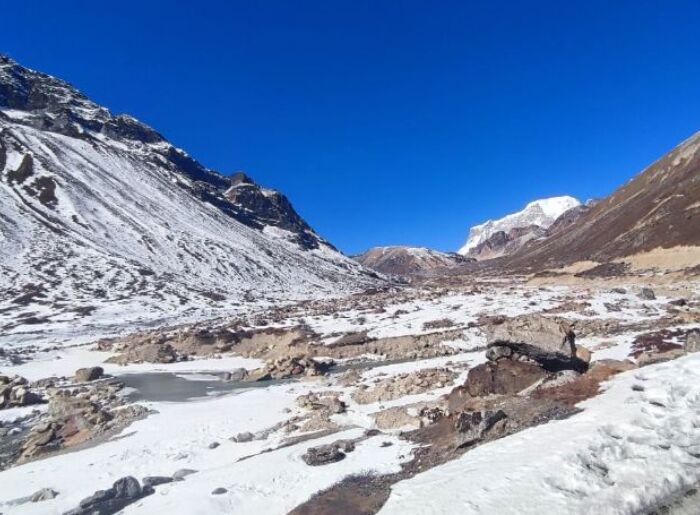 Mountain landscape in North Sikkim surrounded by snow-covered Himalayan peaks