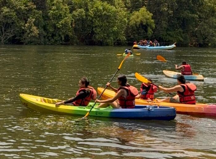 Tourists enjoying adventurous watersports along the beaches of Goa