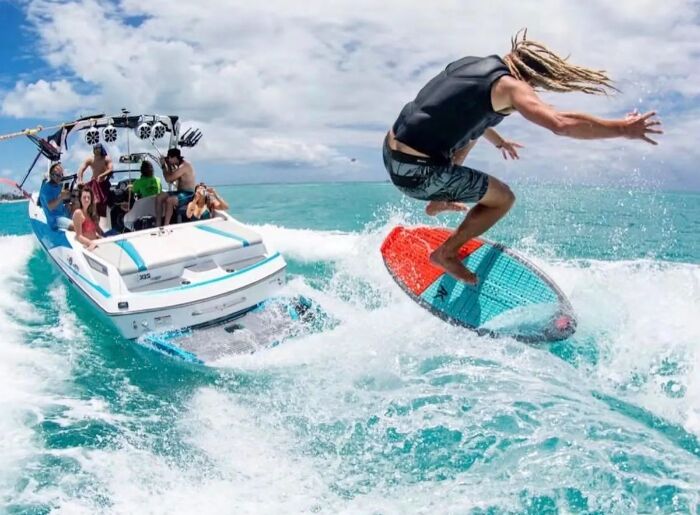 Tourists enjoying adventurous watersports along the beaches of Goa