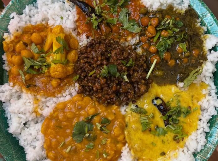10 Best Foods To Try In Himachal Pradesh: Traditional Dishes & Local Drinks 1 Best foods to try in Himachal Pradesh, featuring traditional Himachali dishes including Dham, Siddu, Madra, and Kullu Trout.