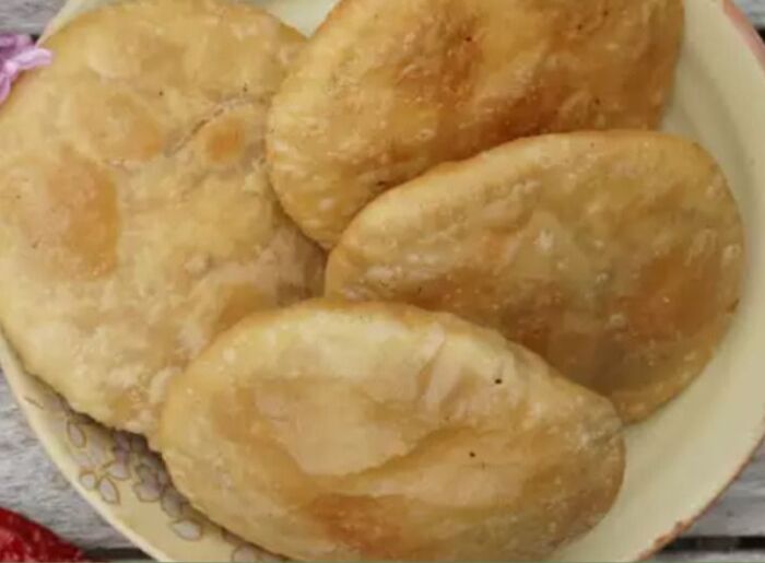 10 Best Foods To Try In Himachal Pradesh: Traditional Dishes & Local Drinks 3 Best foods to try in Himachal Pradesh, featuring traditional Himachali dishes including Dham, Siddu, Madra, and Kullu Trout.
