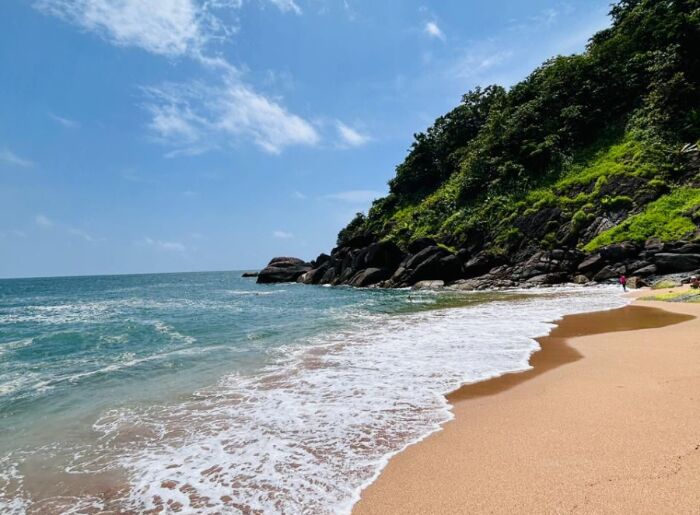 Scenic tourist attractions and places to visit in Malappuram, Kerala, including green hills, waterfalls, and historic landmarks.