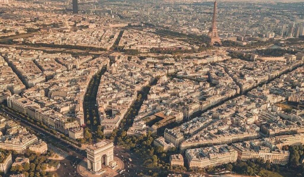 10 Tourist Attractions In Paris You Must Add To Your Must-Visit List 1 Eiffel Tower and Paris skyline