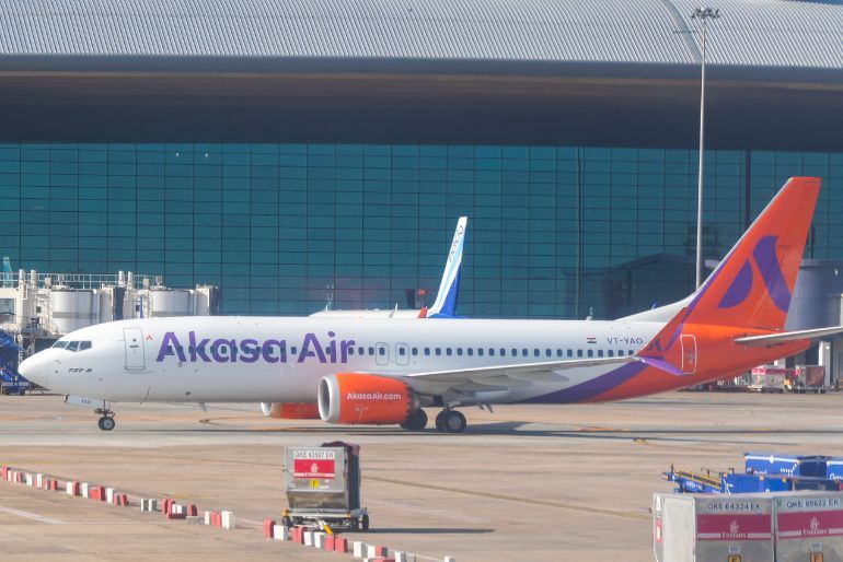 Akasa Air & Air India Group Announce Hike In Fuel Surcharge From October 9 2 Air India Flight at an airport amid revised airline fuel surcharges